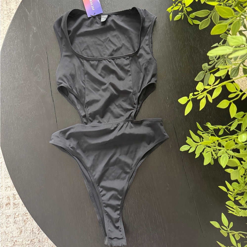 Black cutout bodysuit, new with tags